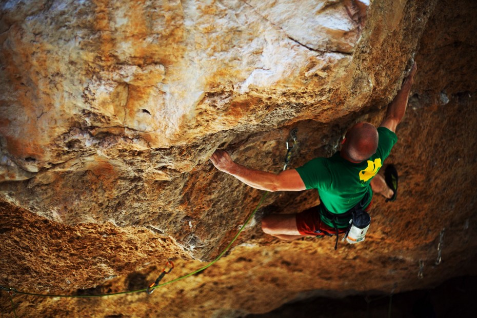 Kris exiting the crux on Ghostdance (13c) at the Sweatlodge, Wyoming. Photo: Becca Skinner