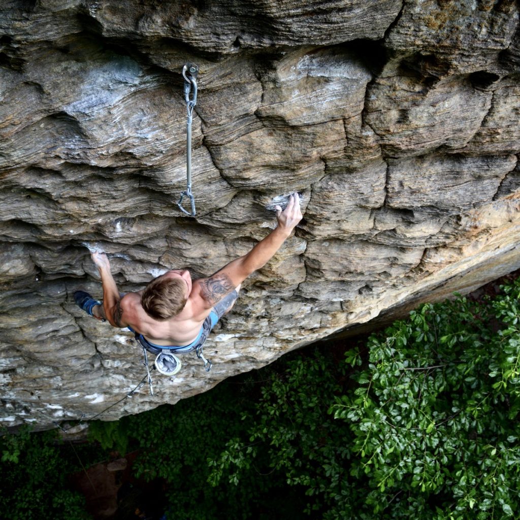 Justin Miniard climbing mosaic